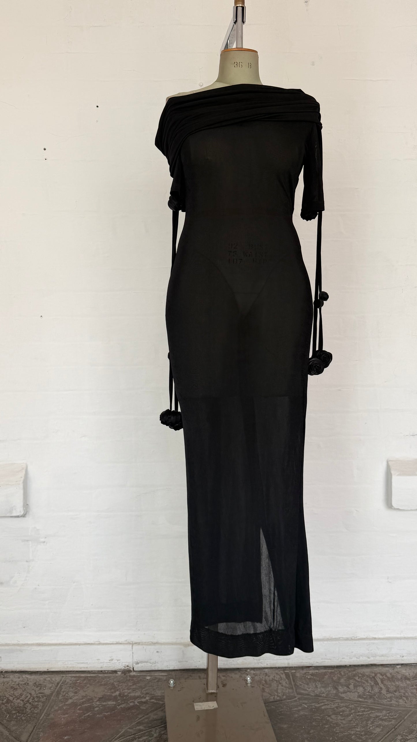 Black Sheer One-Shoulder Draped Maxi Dress with Floral Ties.