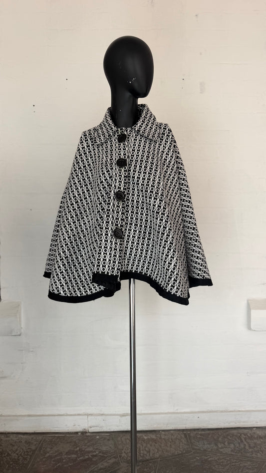 Black & White Geometric Pattern
Button-Front Cape Jacket